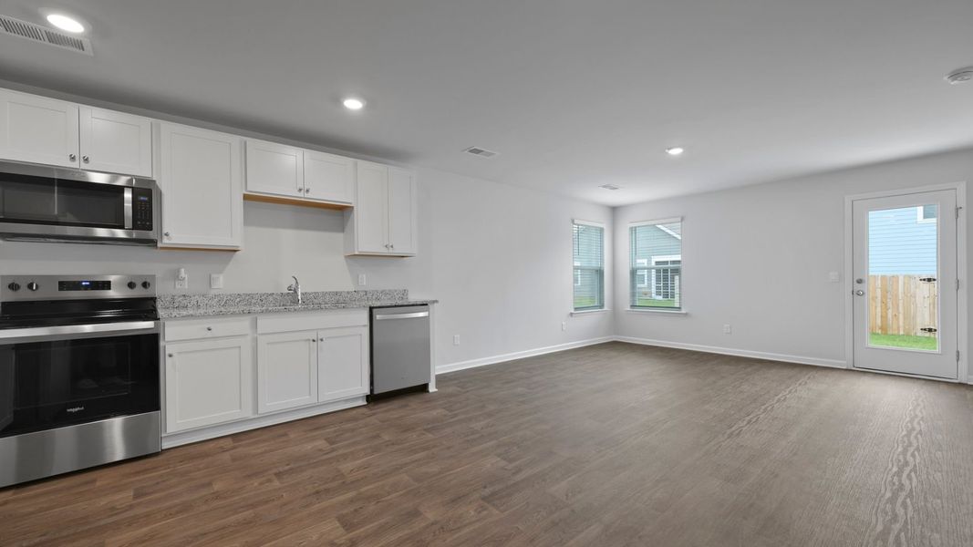 Representative furnished interior of a home built from the SULLIVAN by D.R. Horton in Center Pointe, Santee (Image 7).
