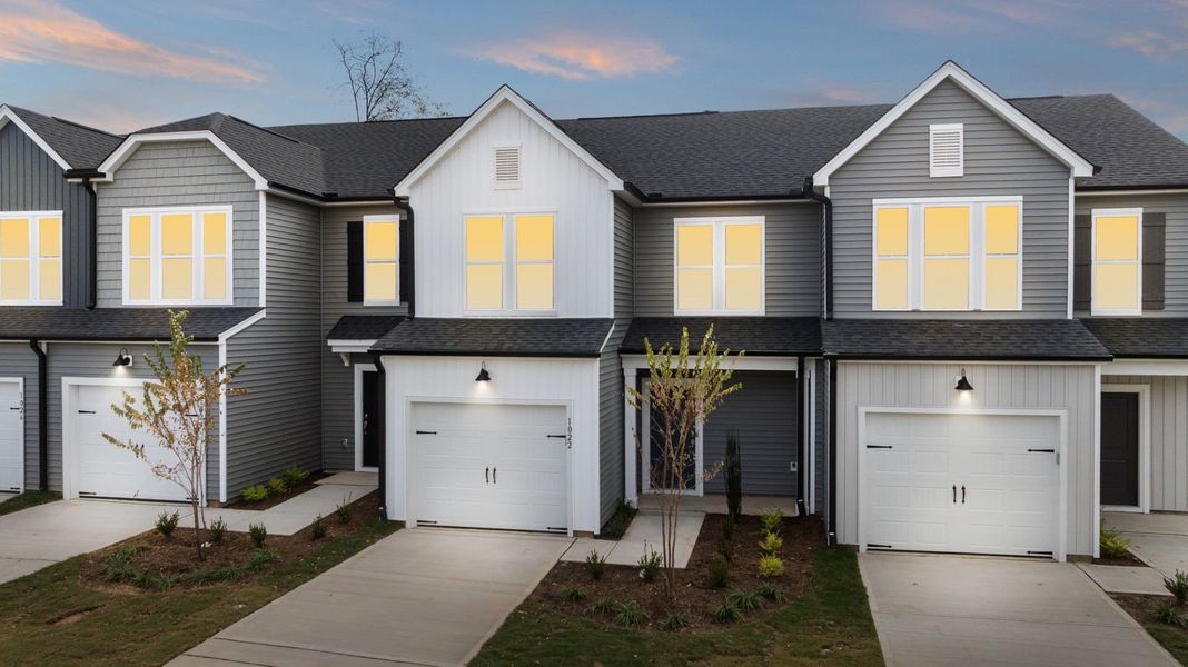 Front exterior of a new home in Poets Walk, Whitsett, NC, highlighting curb appeal (Image 16).