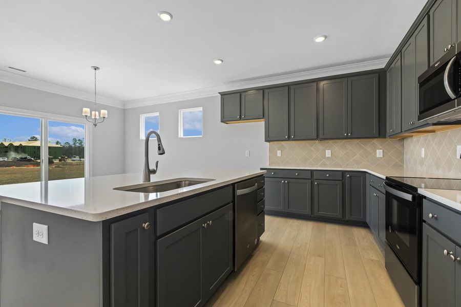 Furnished interior view inside a new home in 1158 Place, Wilson (Image 10).