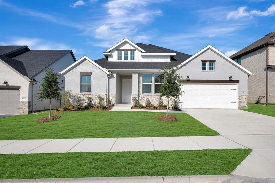 Front exterior of a new home in Elevon, Lavon, TX, highlighting curb appeal (Image 1). Front exterior of a new home in Elevon, Lavon, TX, highlighting curb appeal (Image 1).