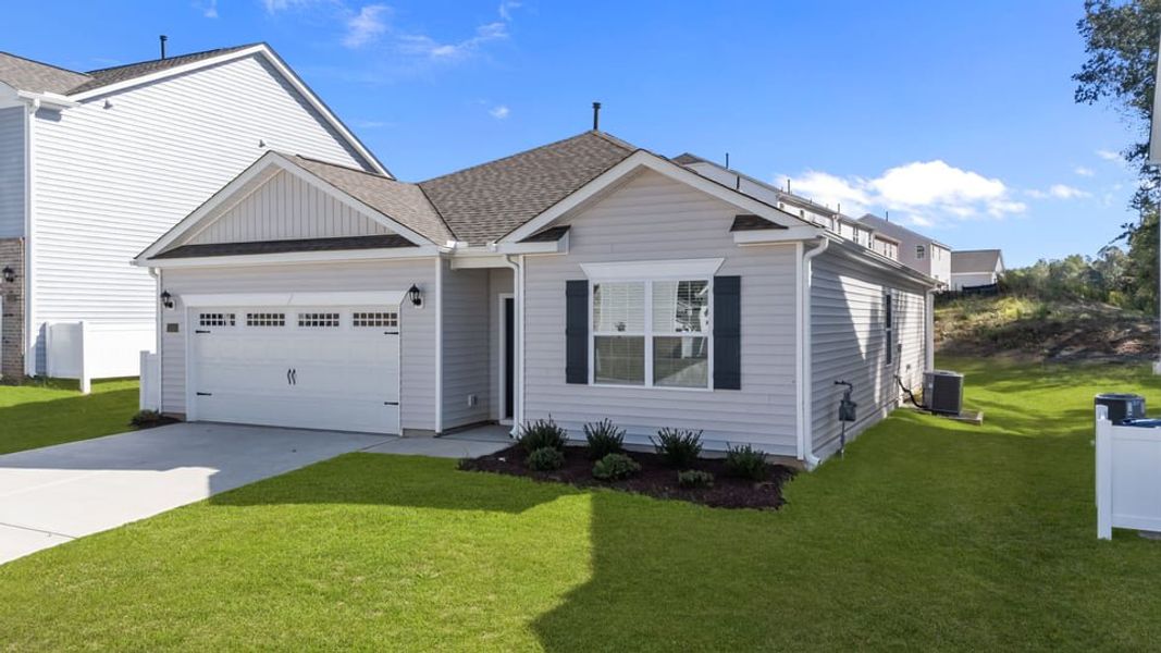 Front exterior of a new home in Saddlebrook, Rocky Mount, NC, highlighting curb appeal (Image 17).