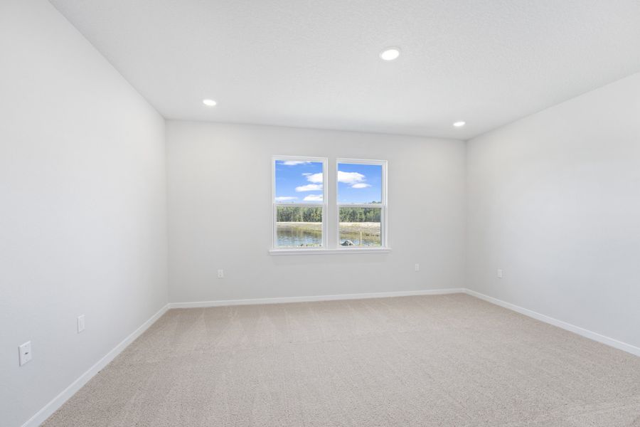 Lot 144 Primary Bedroom with Water View at Camden Woods in Kingsland Lot 144 Primary Bedroom with Water View at Camden Woods in Kingsland
