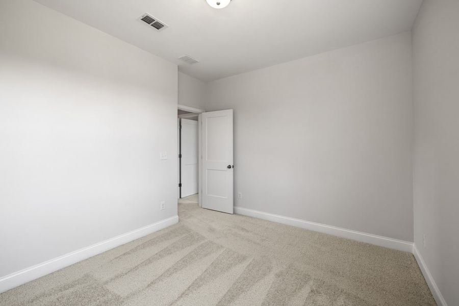 Representative unfurnished interior of a home built from the Atkinson by UnionMain Homes in Austin Springs, Bethlehem (Image 21).
