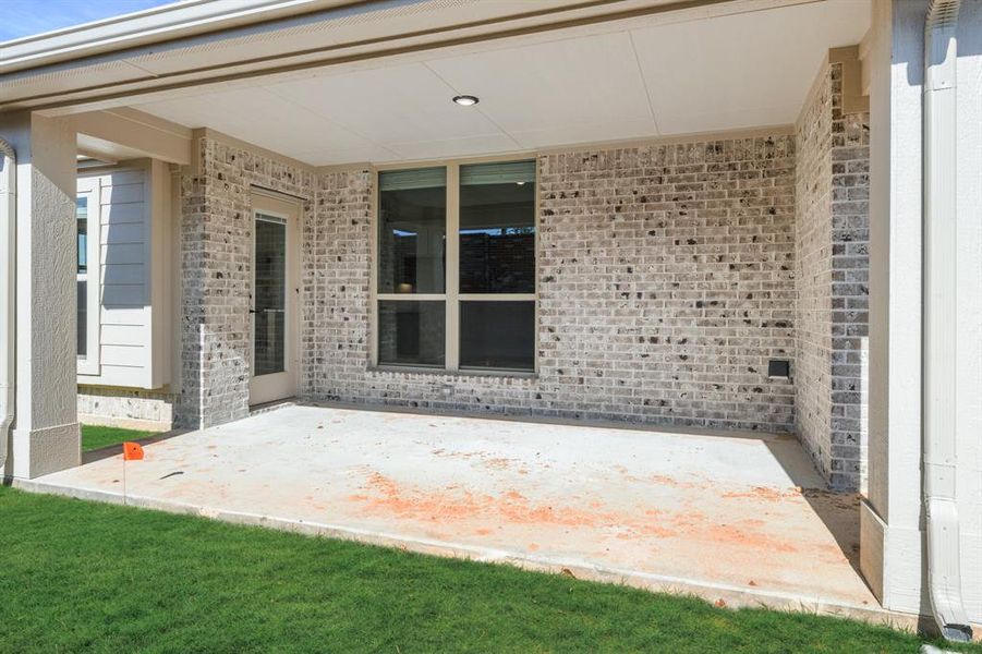 Exterior details and patio area of a home in Mockingbird Hills 60-65, Joshua (Image 3).