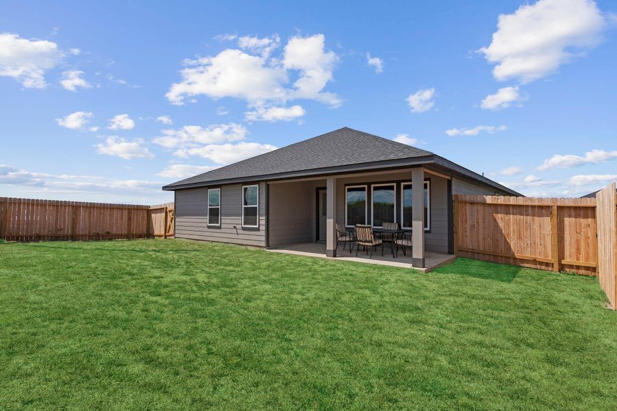 Exterior details and patio area of a home in Emberly, Beasley (Image 3).