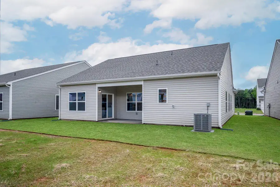 Exterior details and patio area of a home in Ascot Woods, Charlotte (Image 2). Exterior details and patio area of a home in Ascot Woods, Charlotte (Image 2).