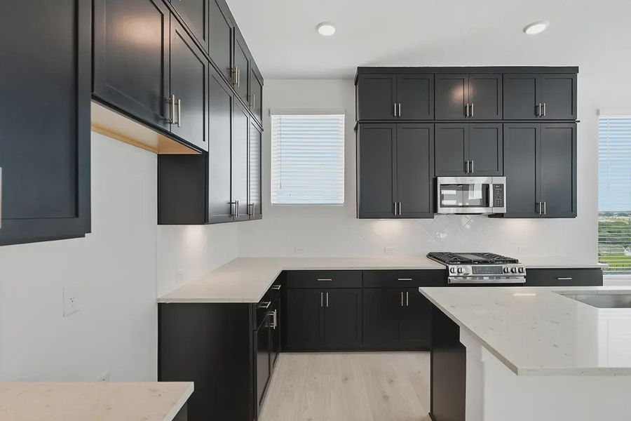 Representative furnished interior of a home built from the Athena by Chesmar Homes in Prominence Urban, San Antonio (Image 6).