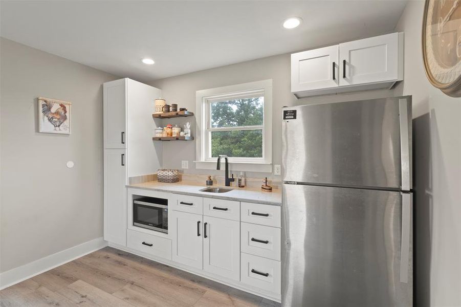 Furnished interior view inside a new home in , Edgewood (Image 16).