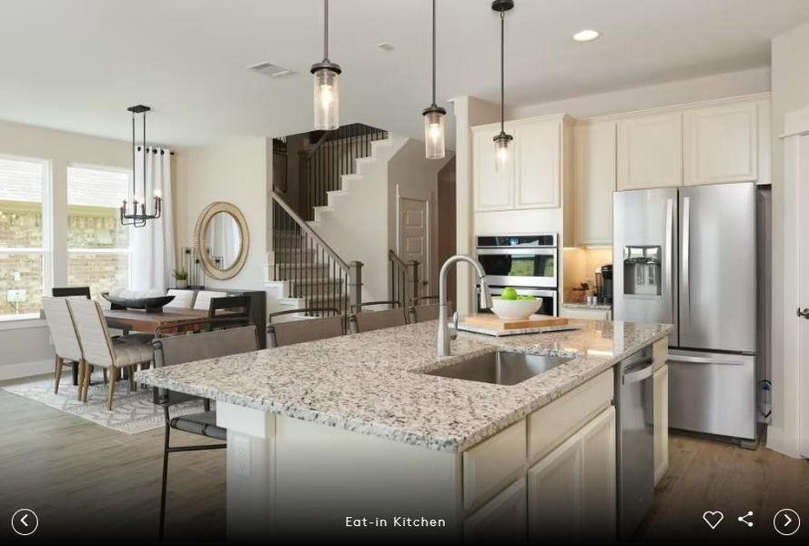 Interior photos- Photo of Pulte model home with same floor plan, not of actual home listed.