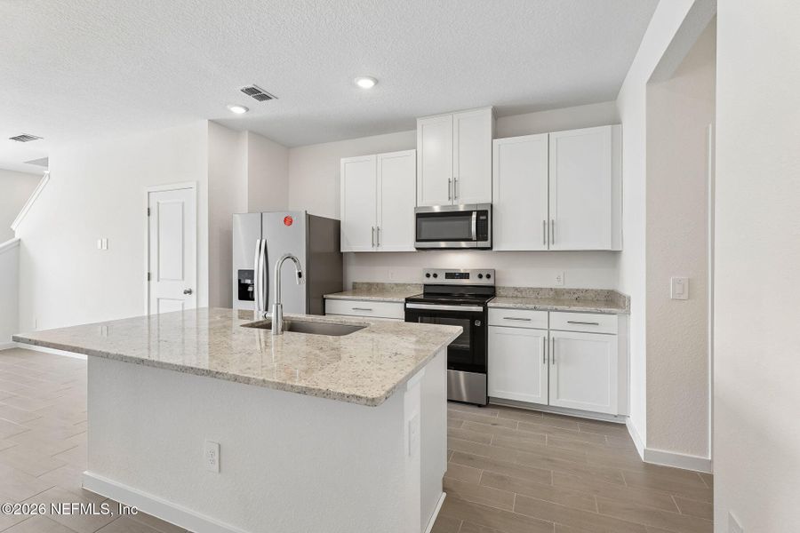 Furnished interior view inside a new home in , Middleburg (Image 9).