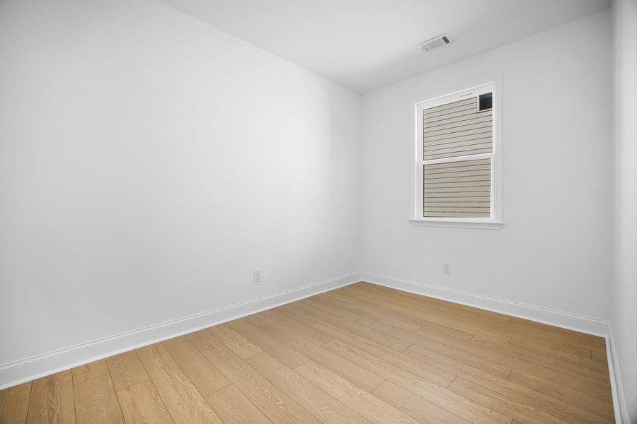Spacious, unfurnished interior of a new home in Bailey Fence, Dacula (Image 31).