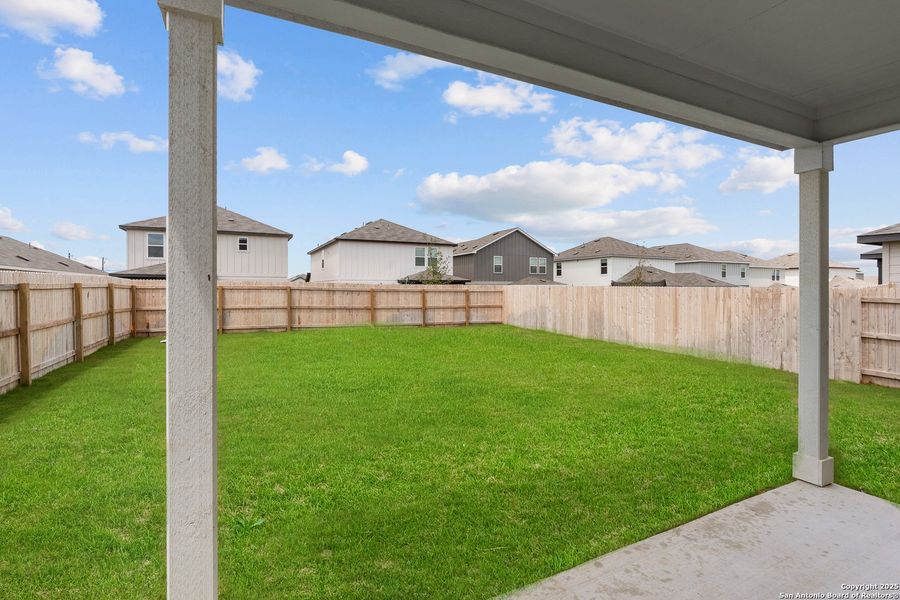 Front exterior of a new home in Lily Springs, Seguin, TX, highlighting curb appeal (Image 18). Front exterior of a new home in Lily Springs, Seguin, TX, highlighting curb appeal (Image 18).