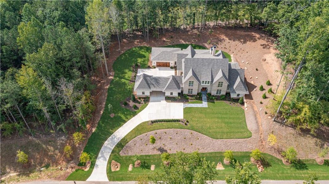 Front exterior of a new home in , Canton, GA, highlighting curb appeal (Image 27).
