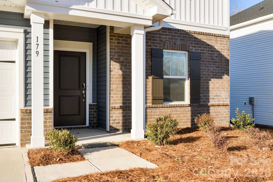 Exterior details and patio area of a home in , Mocksville (Image 3).