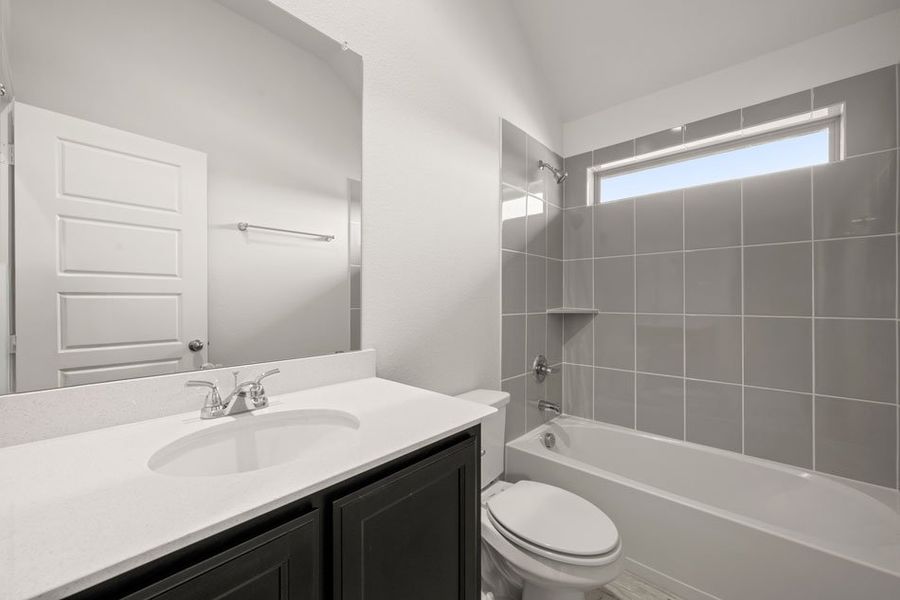 Representative exterior photo of a completed home built from the Balmoral by Impression Homes in Timberbrook, Justin, TX (Image 19).