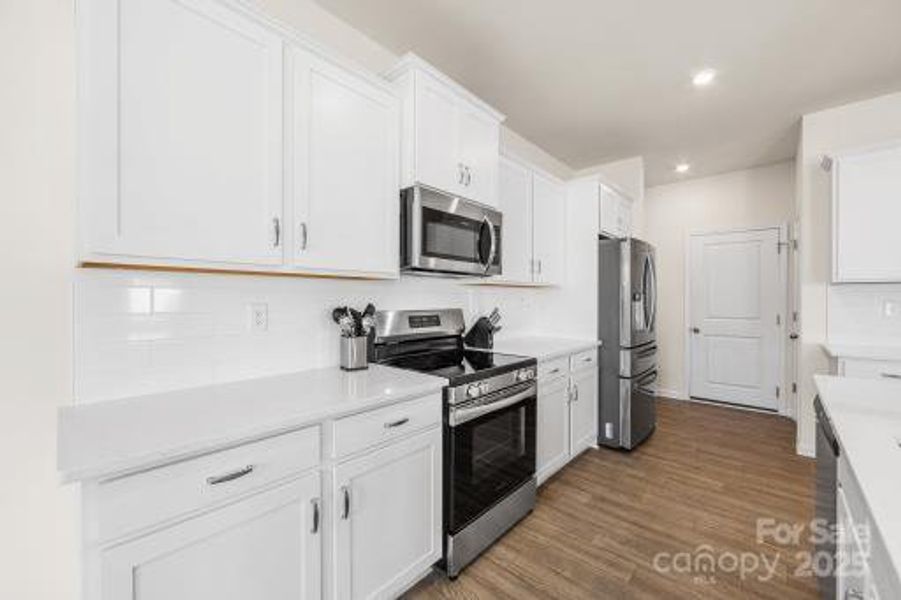 Furnished interior view inside a new home in Wilora Pond, Charlotte (Image 29). Furnished interior view inside a new home in Wilora Pond, Charlotte (Image 29).