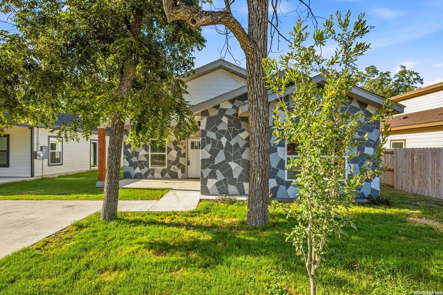 Front exterior of a new home in , San Antonio, TX, highlighting curb appeal (Image 1). Front exterior of a new home in , San Antonio, TX, highlighting curb appeal (Image 1).