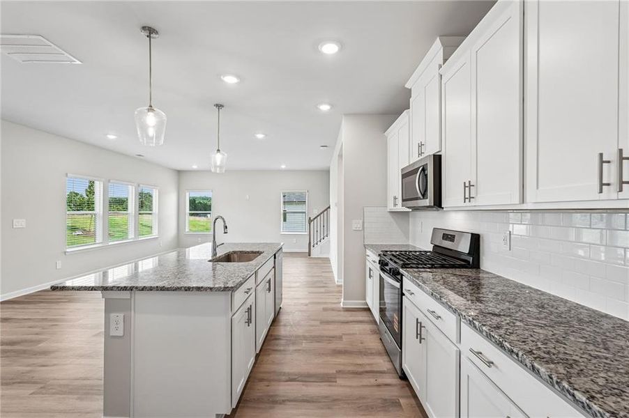 Furnished interior view inside a new home in Northwoods at Mirror Lake, Villa Rica (Image 15).