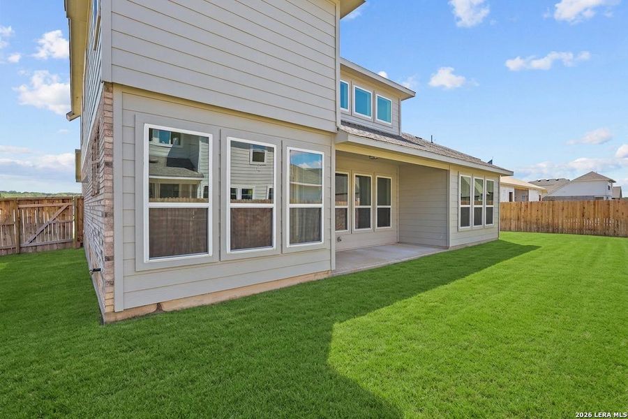 Exterior details and patio area of a home in Megan's Landing, Castroville (Image 4).