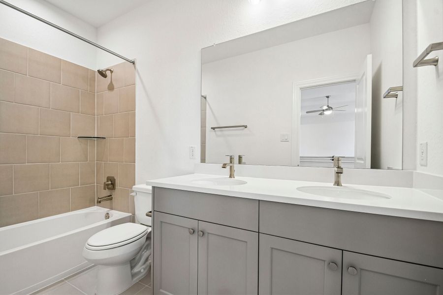 Furnished interior view inside a new home in 6 Creeks, Kyle (Image 11).