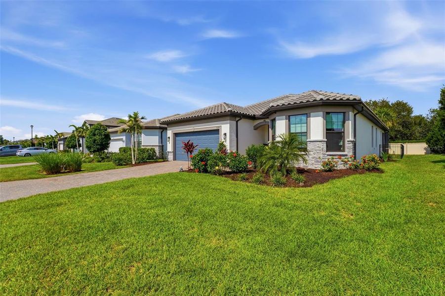 Front exterior of a new home in , Bradenton, FL, highlighting curb appeal (Image 24). Front exterior of a new home in , Bradenton, FL, highlighting curb appeal (Image 24).
