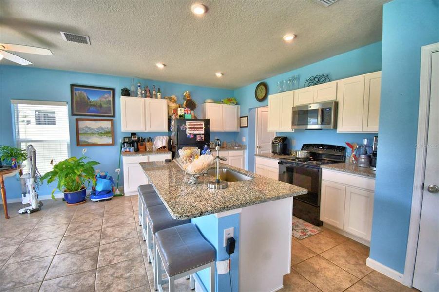 Furnished interior view inside a new home in , Haines City (Image 37). Furnished interior view inside a new home in , Haines City (Image 37).