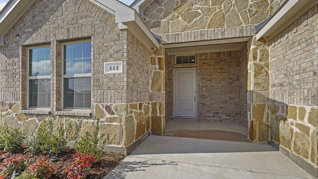Exterior details and patio area of a home in Trailstone, Caddo Mills (Image 3).