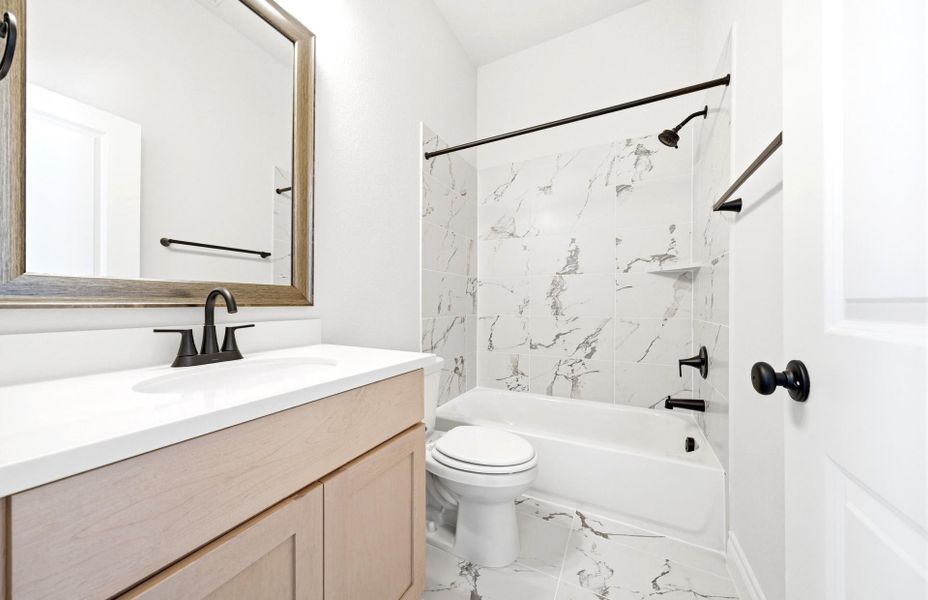 Furnished interior view inside a new home in The Highlands 55′, Porter (Image 10).