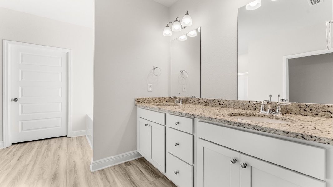 Representative furnished interior of a home built from the The Destin by D.R. Horton in Pine Creek and Heron Walk, Port St. Joe (Image 38).