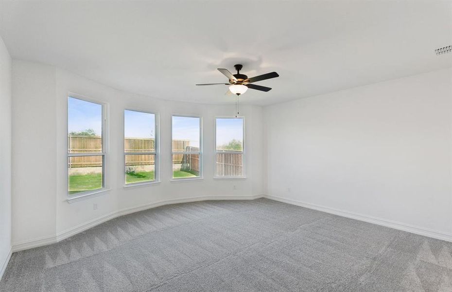 Elegant owner's suite with Bay window *real home pictured