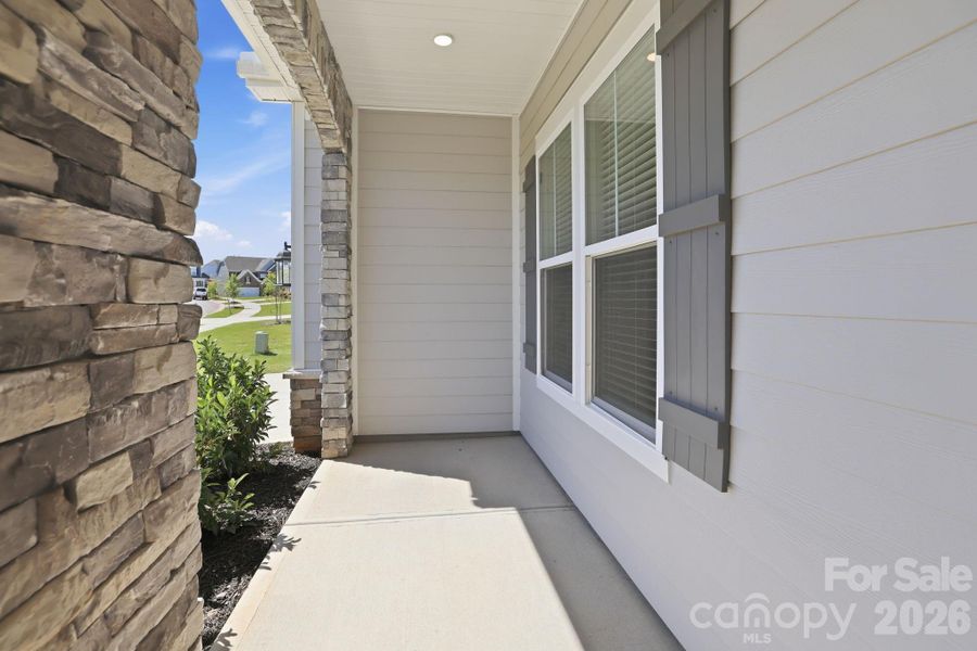 Exterior details and patio area of a home in Estates at Sugar Creek, Indian Land (Image 4).
