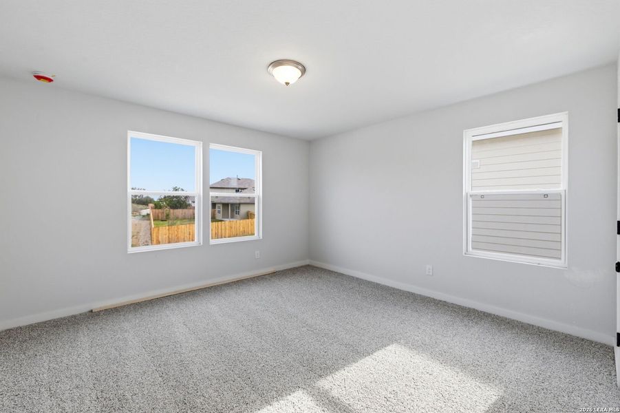 Spacious, unfurnished interior of a new home in The Meadows at Hunters Ranch, San Antonio (Image 25).