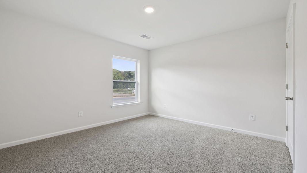 Spacious, unfurnished interior of a new home in Bentley Park, Greenwood (Image 16).