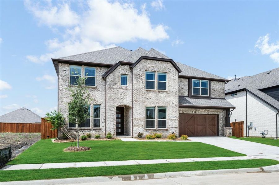 Front exterior of a new home in Sonoma Verde, Rockwall, TX, highlighting curb appeal (Image 26).