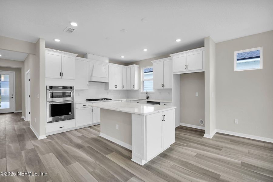 Furnished interior view inside a new home in Del Webb Wildlight, Yulee (Image 5).