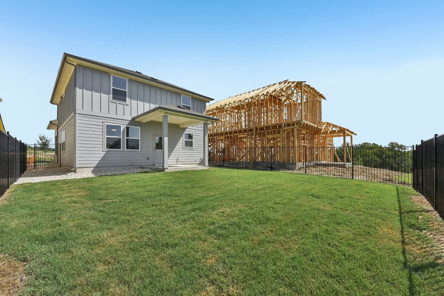 Exterior details and patio area of a home in Saddle Ridge at Wildhorse Ranch, Austin (Image 3). Exterior details and patio area of a home in Saddle Ridge at Wildhorse Ranch, Austin (Image 3).