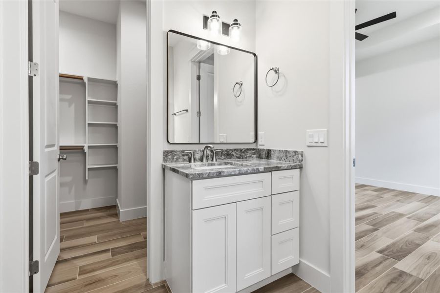 Primary ensuite with views of walk-in closet