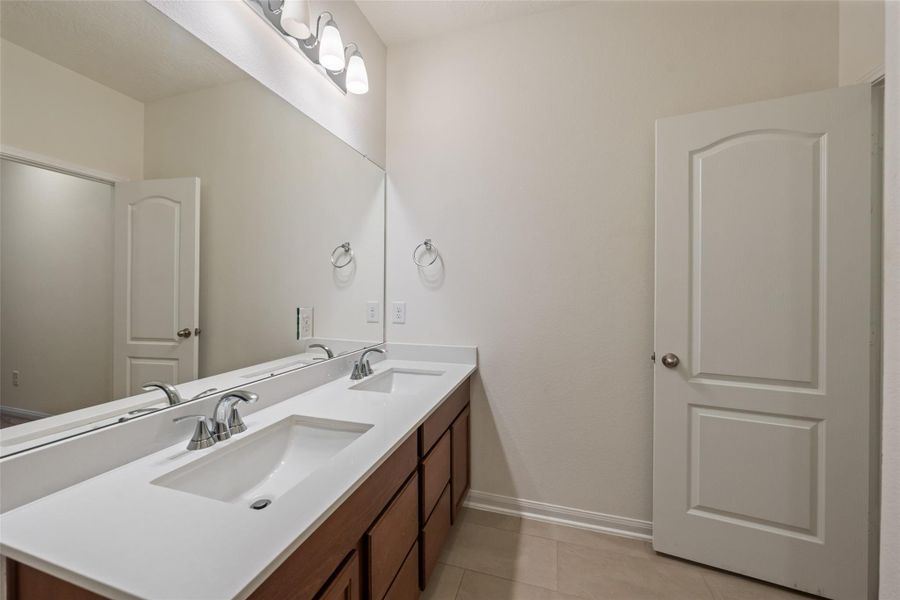 Furnished interior view inside a new home in Grace Landing, Willis (Image 8).