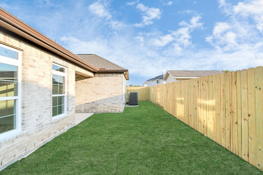 Front exterior of a new home in , Rosharon, TX, highlighting curb appeal (Image 17).
