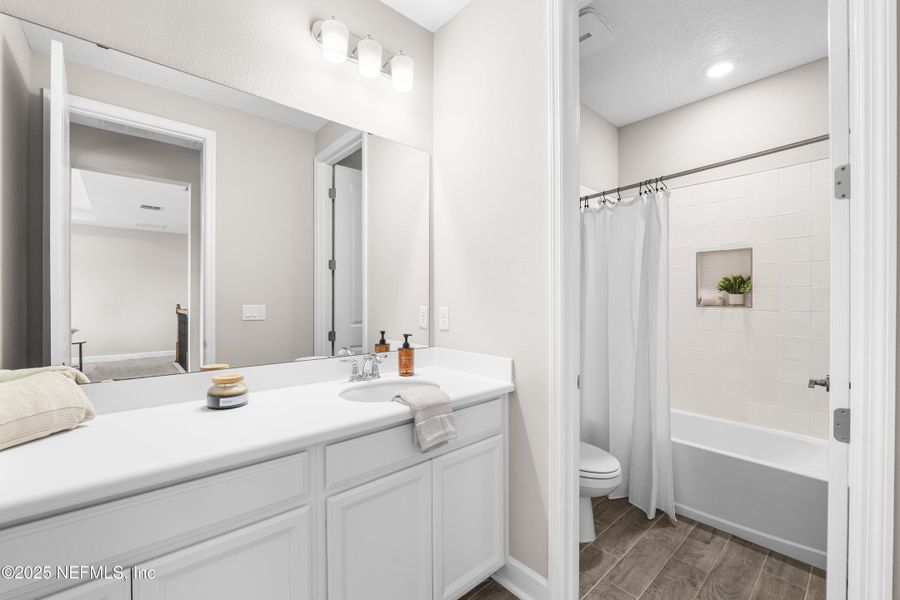 Furnished interior view inside a new home in The Cove at Beachwalk, St. Johns (Image 25). Furnished interior view inside a new home in The Cove at Beachwalk, St. Johns (Image 25).