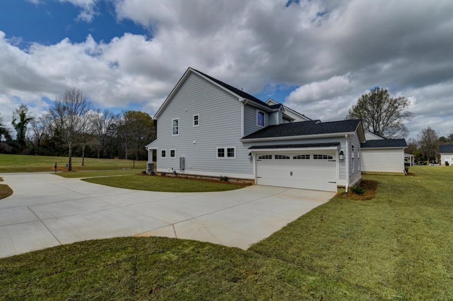 Front exterior of a new home in Clubside Reserve at Summerlake, Lexington, SC, highlighting curb appeal (Image 28).