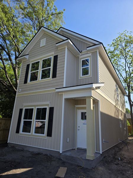 Front exterior of a new home in , North Charleston, SC, highlighting curb appeal (Image 2). Front exterior of a new home in , North Charleston, SC, highlighting curb appeal (Image 2).