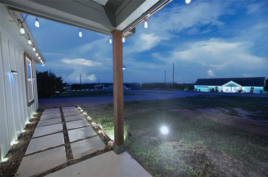 Pathway lights & distant city lights Pathway lights & distant city lights