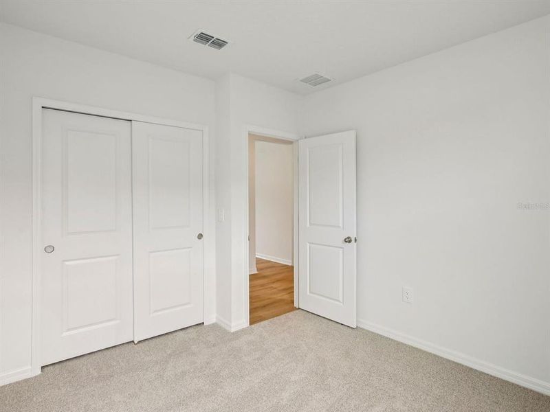 Spacious, unfurnished interior of a new home in Coasterra - Premier Series, Palmetto (Image 23). Spacious, unfurnished interior of a new home in Coasterra - Premier Series, Palmetto (Image 23).