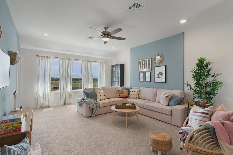 Representative furnished interior of a home built from the Wilshire by Chesmar Homes in Stream Waters, Buda (Image 15).