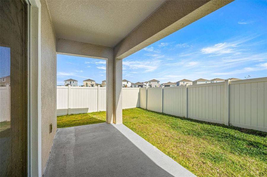 Exterior details and patio area of a home in , Dade City (Image 25).