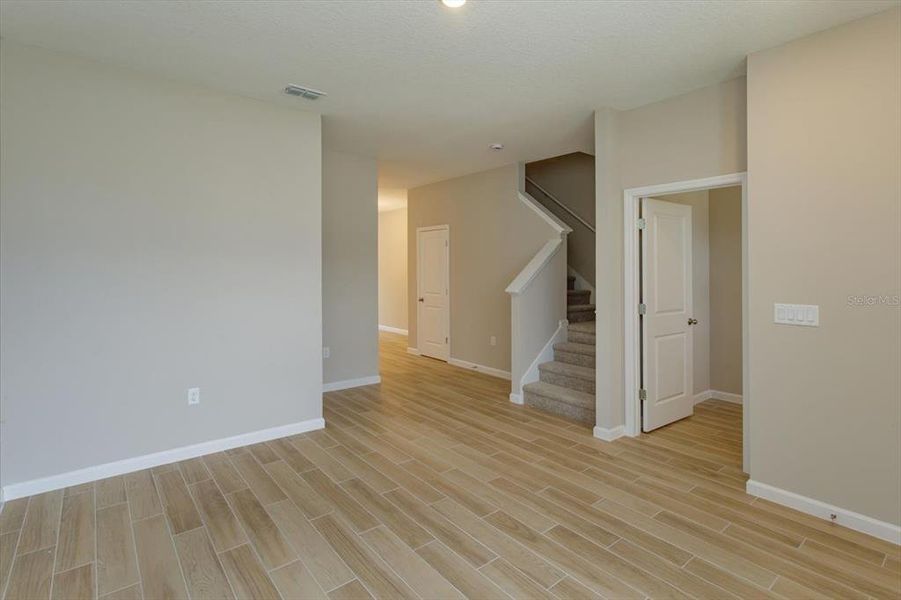 Spacious, unfurnished interior of a new home in Serenade at Ovation, Winter Garden (Image 19).