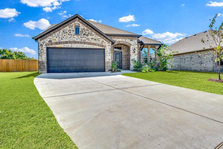 Front exterior of a new home in Summerwood, Red Oak, TX, highlighting curb appeal (Image 23).