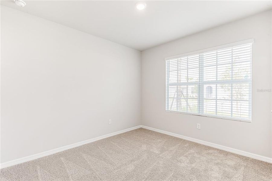 Spacious, unfurnished interior of a new home in Seagrass, Punta Gorda (Image 16).
