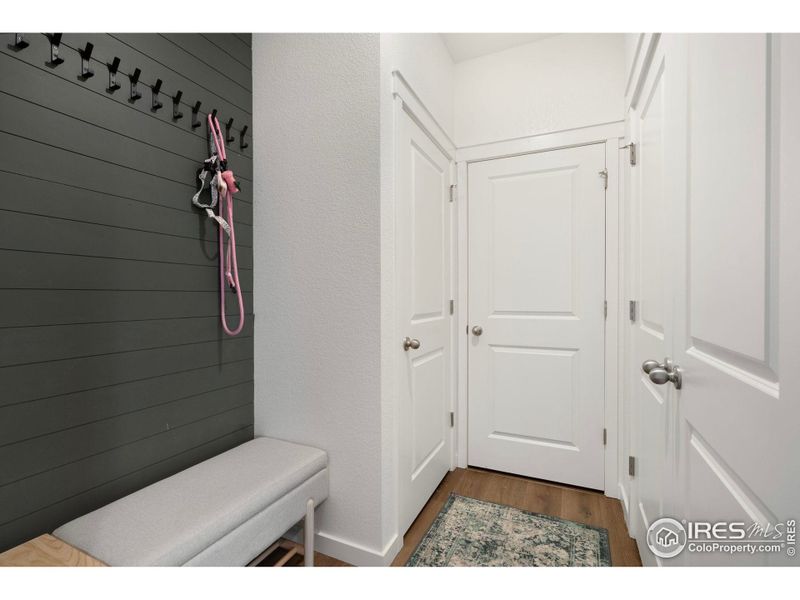 Custom drop zone with on-trend shiplap wall. Custom drop zone with on-trend shiplap wall.